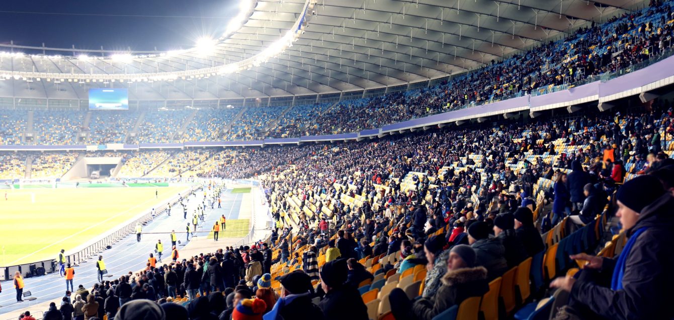 Football fans in a stadium for Euros 2024