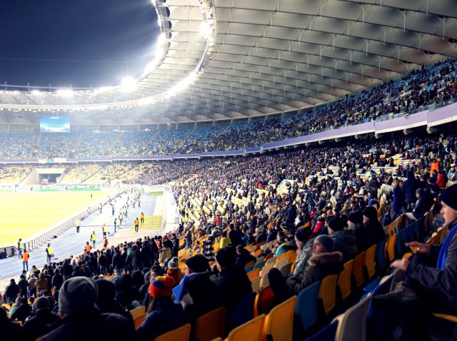 AdobeStock_137837344-scaled-1 Football fans in a stadium for Euros 2024